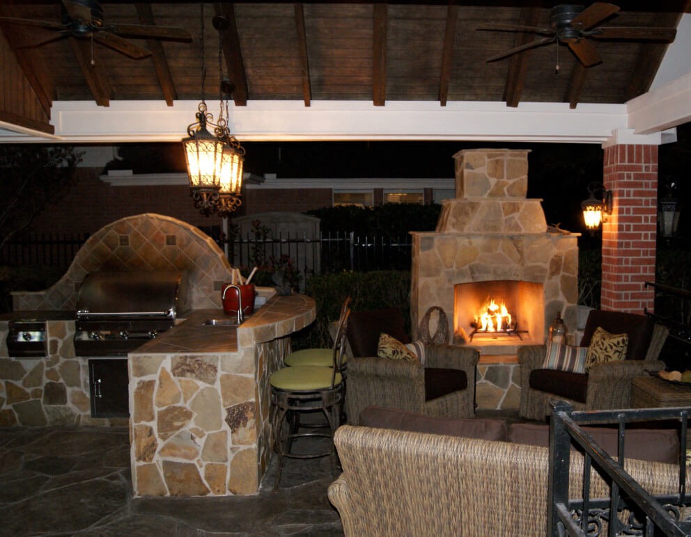 Gable Roof Patio with Outdoor Kitchen and Fireplace in Falcon Point