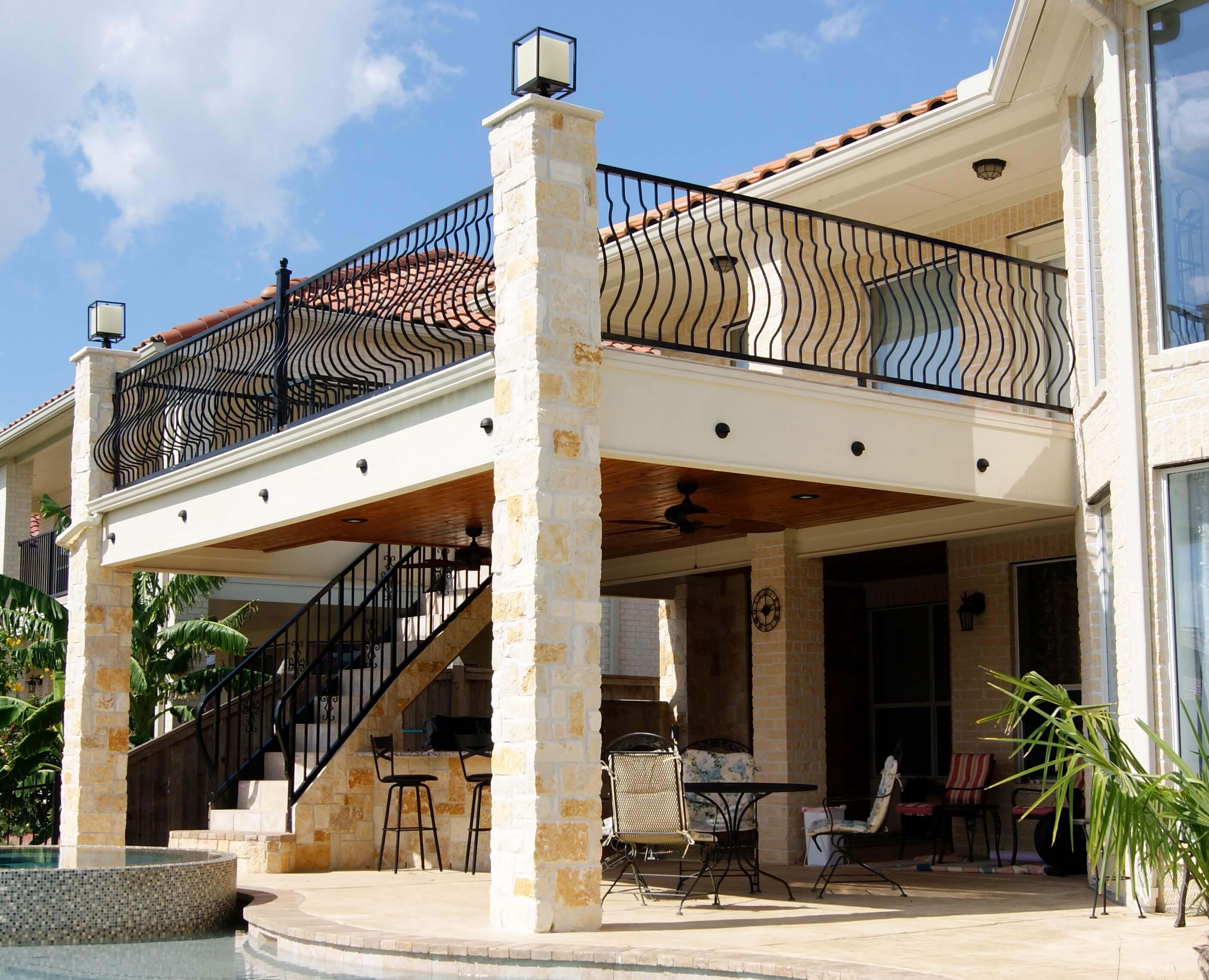 Balcony with Stairs & Kitchen - Texas Custom Patios
