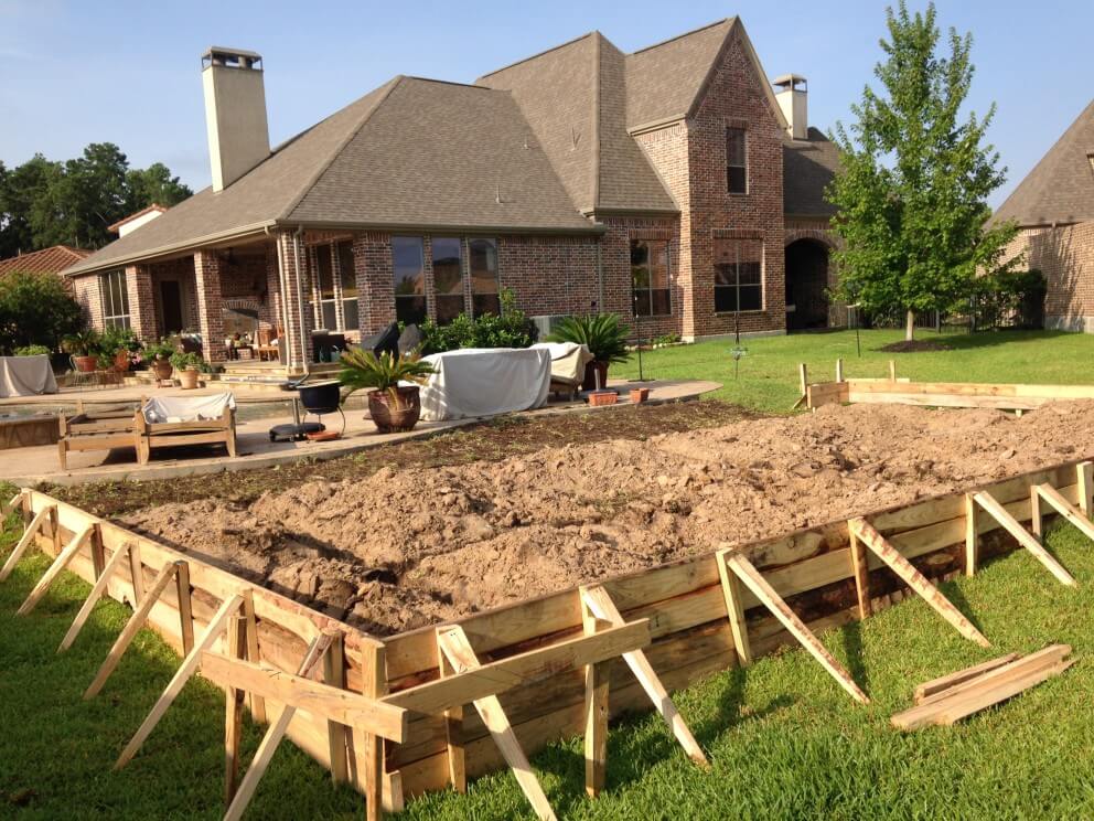 Setting forms for the foundation and looking back toward the home and the pool.