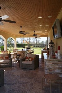 North Houston pool cabana with stamped concrete and pine ceiling
