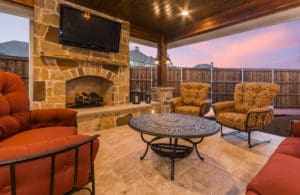 Outdoor fireplace in outdoor living room Lewisville