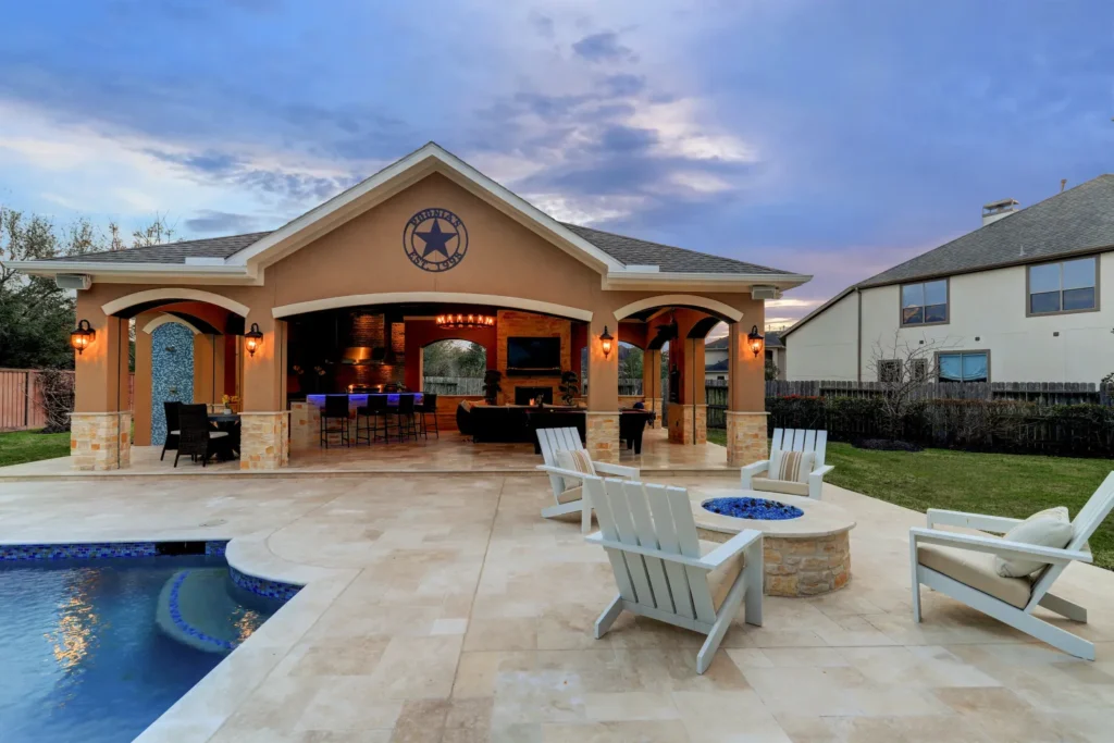 New Pool House with outdoor kitchen and fireplace in Sugar Land